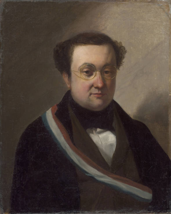 Portrait classique d'un homme avec des lunettes et une écharpe tricolore
